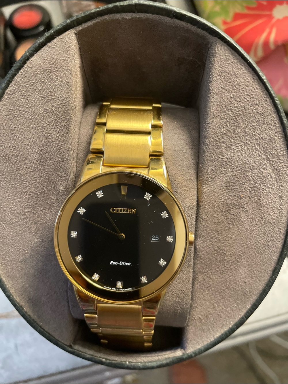 Citizen Gold and Black Men’s Dress Eco-Drive Watch Women can also wear the watch